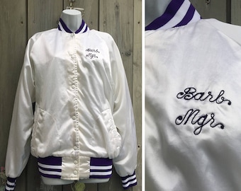 Vintage jacket | 1980s white satin varsity team jacket with purple trim