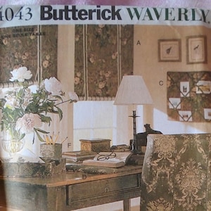 May include: A vintage sewing pattern for a chair cover featuring a floral design. The pattern is labelled "4043 Butterick Waverly" and includes instructions for creating a chair cover with a pleated skirt.