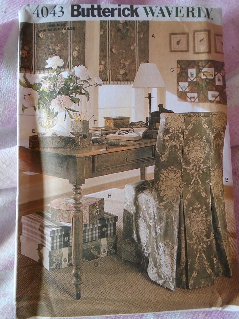 May include: A vintage sewing pattern for a chair cover featuring a floral design. The pattern is labelled "4043 Butterick Waverly" and includes instructions for creating a chair cover with a pleated skirt.