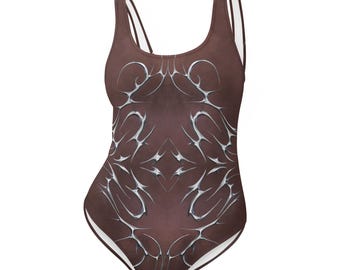 Gewassen bruin badpak met zilveren tribal design