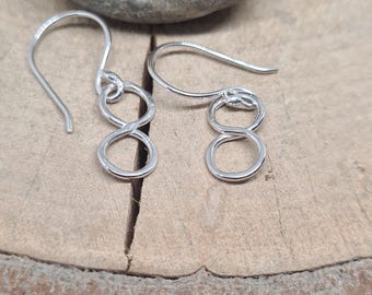 Infinity dangle earrings sterling silver