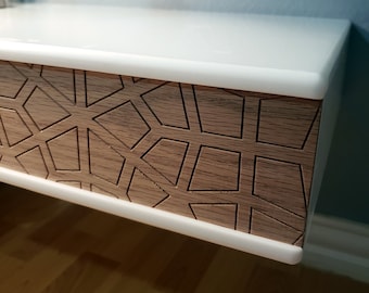 Floating nightstand table with hidden shelf