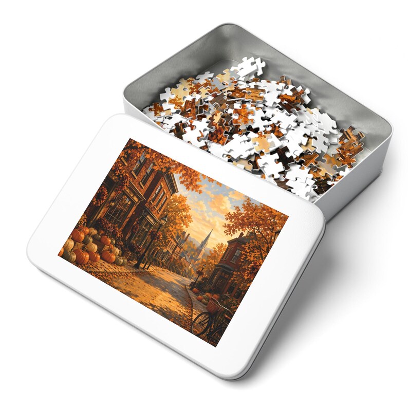 Rompecabezas "Cozy Cottage Seasons Autumn Main Street", "Pueblo pequeño", caja de metal (252 piezas) imagen 3