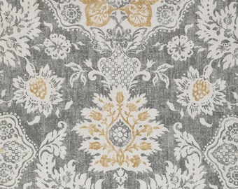 May include: A gray and white floral pattern with gold accents. The pattern is a damask design with intricate details. The background is a textured gray.