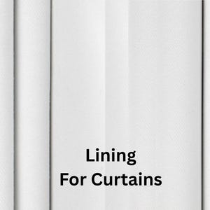 May include: White curtain lining fabric, tightly folded, with the words "Lining For Curtains" in black text. The fabric is a solid white color, and the folds create vertical lines.