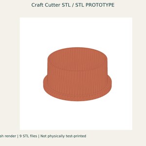 Peut inclure: Un rendu 3D numérique d'un emporte-pièce cylindrique avec une texture extérieure nervurée de couleur terre cuite. L'image inclut le texte Craft Cutter STL / STL PROTOTYPE en haut et Original mesh render | 9 STL files | Not physically test-printed en bas.