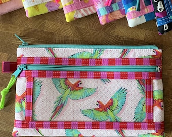 Macaws + Stripes (Twice As Nice Pouch) with Clear Vinyl Front Pocket. Tula Pink: Daydreamer + Tent Stripes.