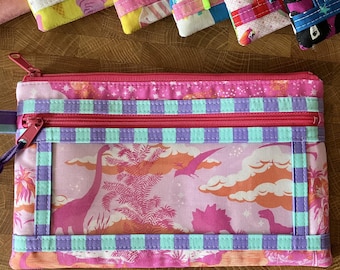 Dinos + Stripes (Twice As Nice Pouch) with Clear Vinyl Front Pocket. Tula Pink: Roar, Meteor Showers + Tent Stripes.