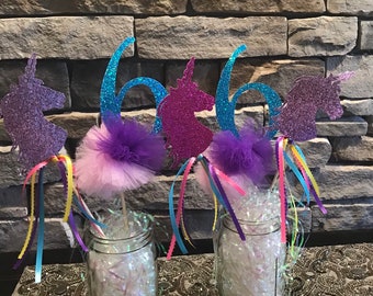 Unicorn Party Centerpieces. Custom order with the Birthday child's age. Unicorn Wands double as favors. #unicorn #unicornparty #kidsbirthday
