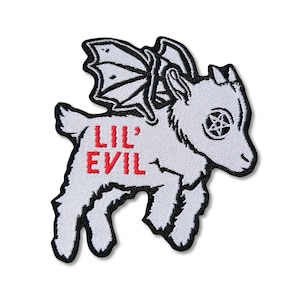 May include: White embroidered patch of a flying goat with black wings and a pentagram in its eye. The goat has the words "Lil' Evil" written in red on its side.