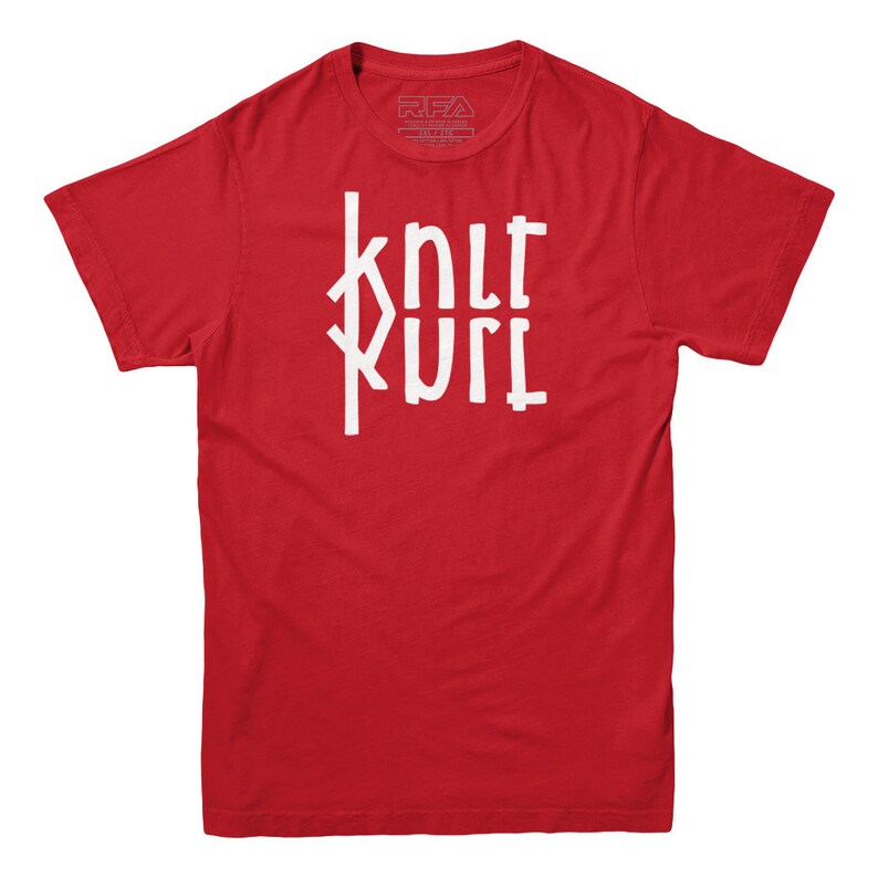 May include: Red short-sleeved t-shirt with a white graphic that says "knit kurl" in a stylized font.