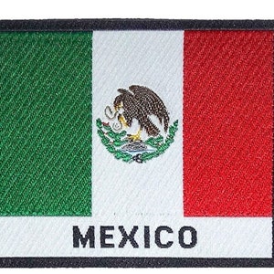 May include: An embroidered patch featuring the Mexican flag. The flag is green, white, and red with the Mexican coat of arms in the centre. The words "MEXICO" are printed below the flag.