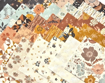 May include: A collection of square fabric swatches arranged in a fan pattern. The fabric pieces feature various prints including floral motifs, geometric shapes, and abstract patterns in a color palette of cream, brown, rust, gold, and light blue.
