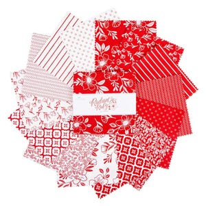 May include: A collection of red and white fabric squares arranged in a circular pattern. The fabric features various patterns, including floral, striped, and geometric designs. A label in the center reads "Radiant Ruby".