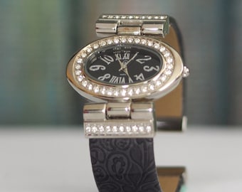 Reloj de pulsera de cuarzo para mujer Planet