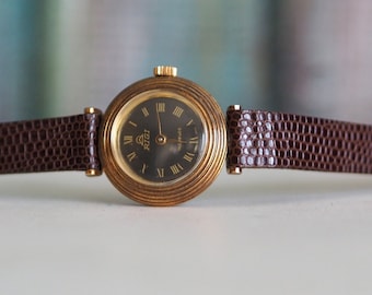RIGI  -  Swiss women's watch RIGI,mint, unworn , with tags,  vintage mechanical wind up women's  watch