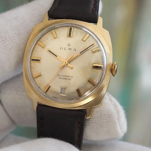 OLMA - Swiss made mechanical self winding men's watch   - 1960's, 18k  .750 solid gold case, automatic movement ETA 2782