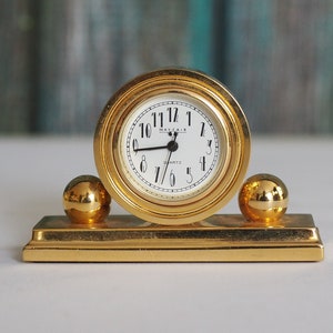MAYFAIR miniature quartz brass clock , art deco style