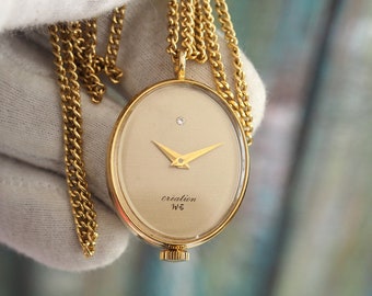 CRÉATION - Montre vintage pendentif/collier pour femme à remontage mécanique de fabrication suisse