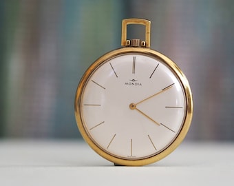 Reloj mondia de oro hotsell