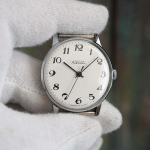 RAKETA  Classic -  vintage mechanical wind up men&#39;s watch Raketa , mint condition, unworn