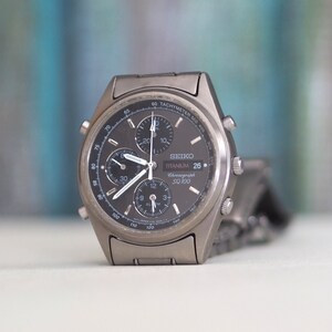 SEIKO Alarm Chronograph SQ 100 Titanium, japanische Quarz 