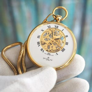 Orologio da tasca scheletrato color oro – Prodotto in Svizzera, a carica manuale, Gebr. Sommé Nachf Since 1794, cassa da 47 mm – Orologio vintage steampunk per uomo