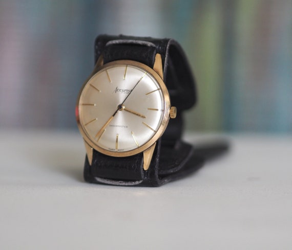 ACCURIST - .375 , 9K gold  Swiss made mechanical … - image 1