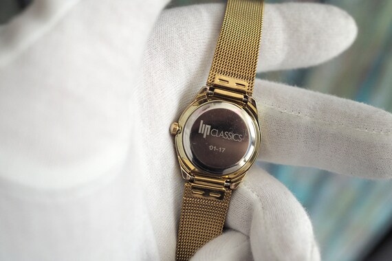 Montre LIP Henriette femme bracelet métal doré