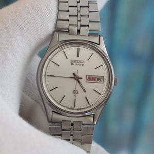 Vintage Seiko Quartz 6923-7000 Watch 34mm Stainless Steel Day Date Japan 1970s