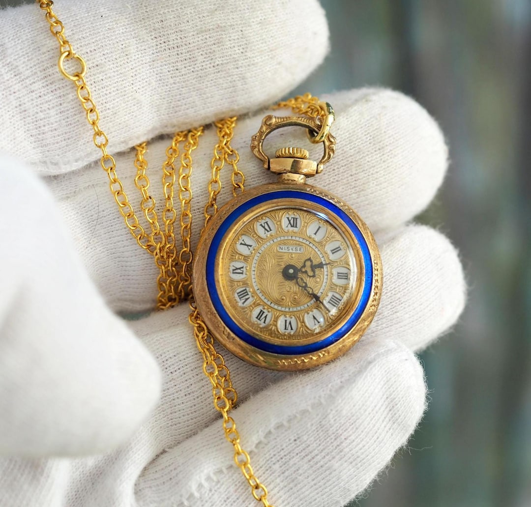 Collana con orologio vintage in smalto floreale: ciondolo