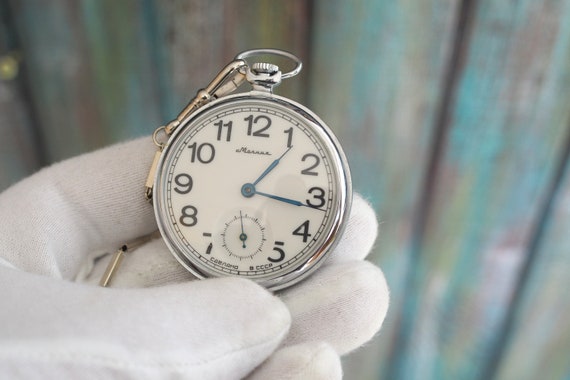 Molnija pocket watch value sale