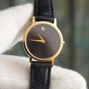 Movado Museum Ladies Quartz Watch 87-25-832 Black Dial Gold Case 25mm