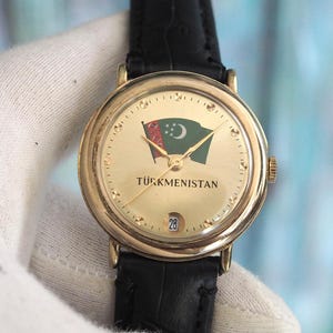 Rare Vintage Raketa Watch – Turkmenistan Dial – Gold-Tone Case 34mm – Mint Unworn with Date Display – Collectible USSR Era