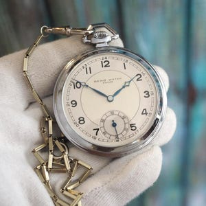 Montre Beno Ancre – Boîtier de 51 mm, mouvement mécanique 15 rubis, ton argent vintage avec chaîne, fabrication suisse
