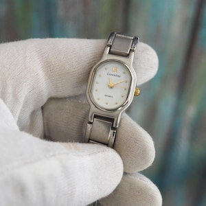 Orologio al quarzo Lorentini – Cassa ovale 19 x 25 mm, bracciale in acciaio inossidabile, quadrante bianco, orologio da donna vintage bicolore, lunghezza 185 mm