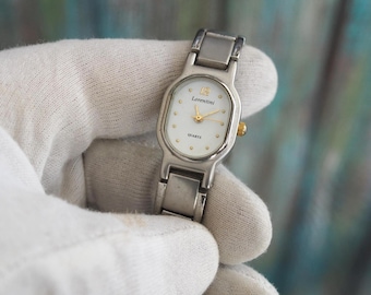 Reloj vintage para mujer Lorentini: acero inoxidable bicolor, caja ovalada