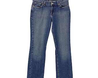 May include: Medium-wash blue denim jeans featuring a classic five-pocket design, a button and zipper fly closure, belt loops at the waistband, and a straight-leg cut with subtle fading along the thighs and knees for a worn-in appearance.