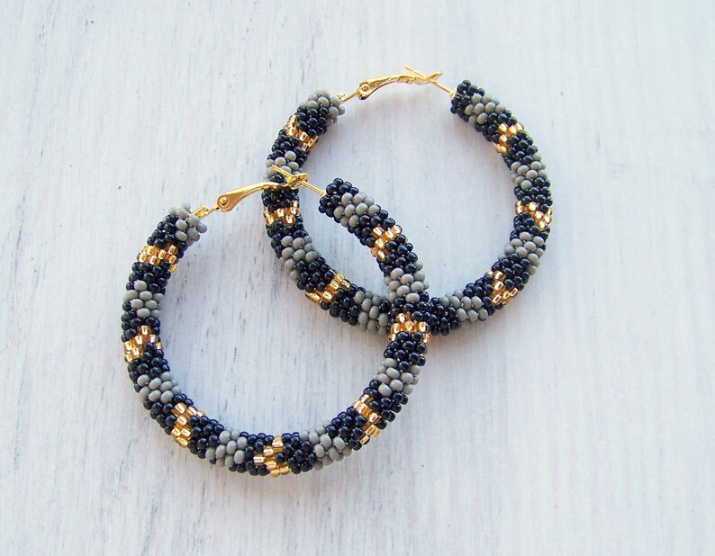black snake hoop earrings