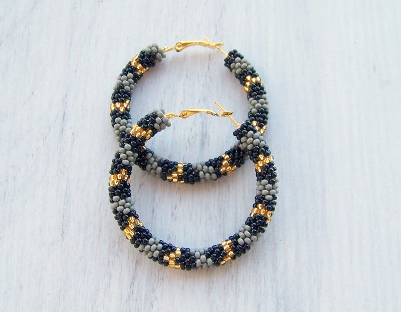 black snake hoop earrings