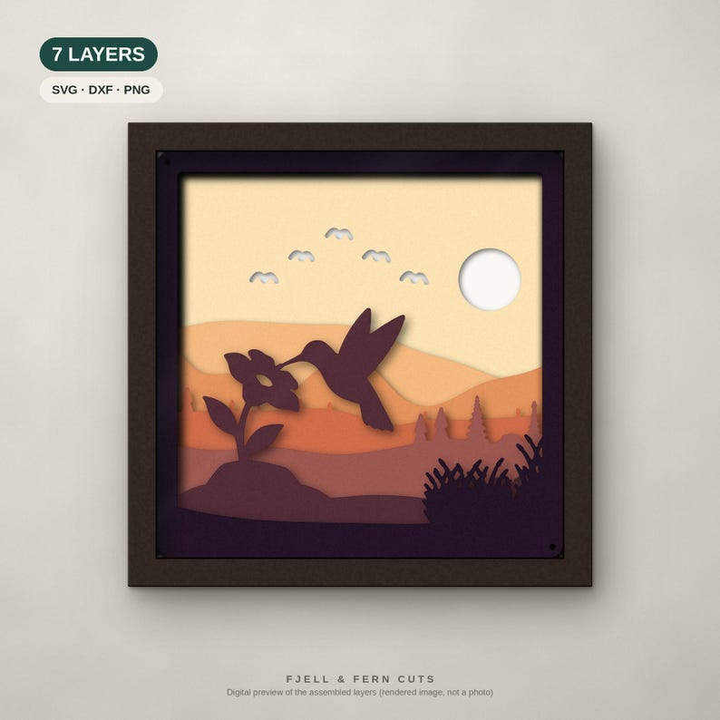 May include: A square 7-layer paper cut art piece in a dark frame featuring a hummingbird hovering over a flower. The scene includes a sun, clouds, and layered hills in shades of yellow, orange, and purple. Text reads 7 LAYERS, SVG, DXF, PNG, and FJELL & FERN CUTS.
