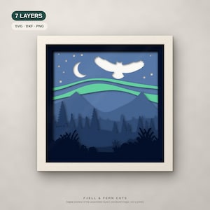 May include: A square framed 7-layer paper cut art piece featuring a night landscape with a white owl, a crescent moon, stars, and green aurora borealis over blue mountains and pine trees. Text reads 7 LAYERS, SVG, DXF, PNG, FJELL & FERN CUTS.