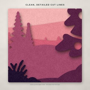 May include: A multi-layered paper craft design in shades of pink and purple featuring a forest landscape with pine trees and rolling hills. The text CLEAN, DETAILED CUT LINES is visible at the top, and a small caption is at the bottom.