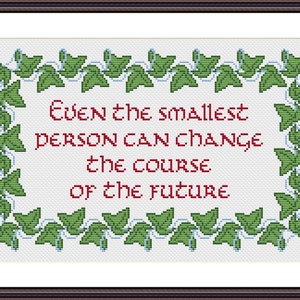 May include: Cross-stitch embroidery with a white background and a green ivy border. The text reads "Even the smallest person can change the course of the future."