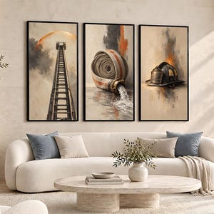 May include: A triptych wall art set featuring three vertical framed prints. The left panel shows a tall fire ladder reaching upward. The center panel depicts a coiled fire hose spraying water. The right panel displays a dark firefighter helmet.