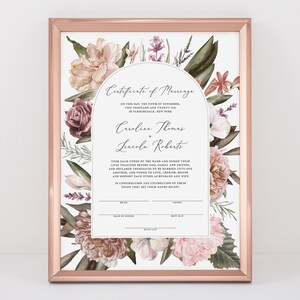 May include: A printable marriage certificate with a floral design featuring pink and purple flowers. The text reads "Certificate of Marriage" and includes the names "Caroline Thomas" and "Lincoln Roberts".