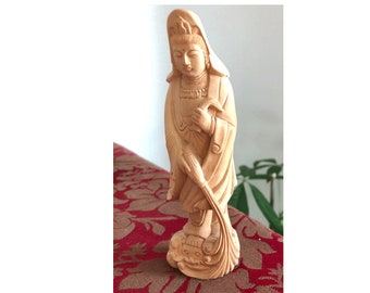 Hand carved Woman Figurine