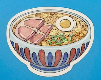 May include: A sticker featuring a bowl of ramen with a light blue and red patterned exterior. The bowl contains noodles in a golden broth, topped with two slices of pink pork, a halved boiled egg with a yellow yolk, and sliced green onions.