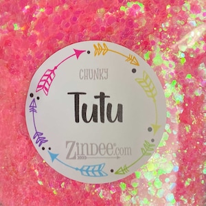 May include: Pink chunky glitter with a white label that says "CHUNKY Tutu zindee.com" with colorful arrows around the label.