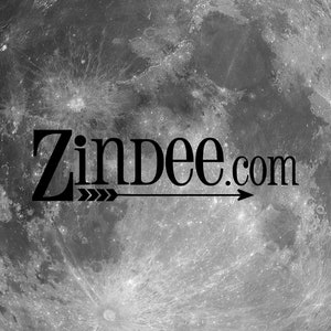 May include: Black and white image of the moon with the text "Zindee.com" and an arrow pointing to the right.